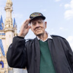 World War II veteran in front of Cinderella Castle, Walt Disney World